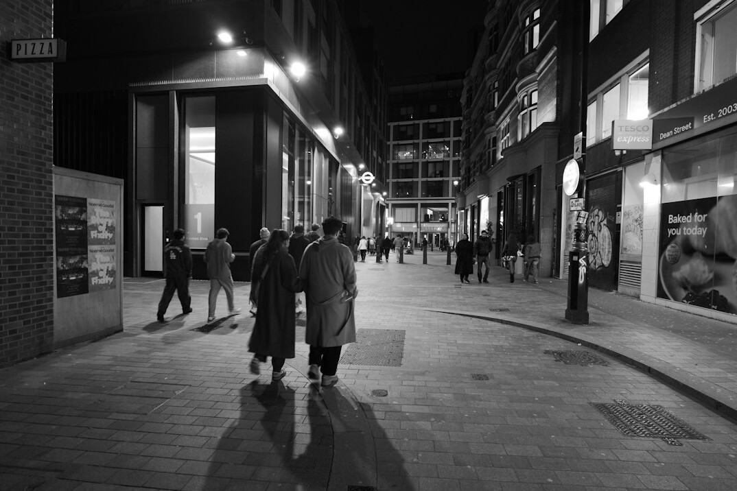 people walking in city street