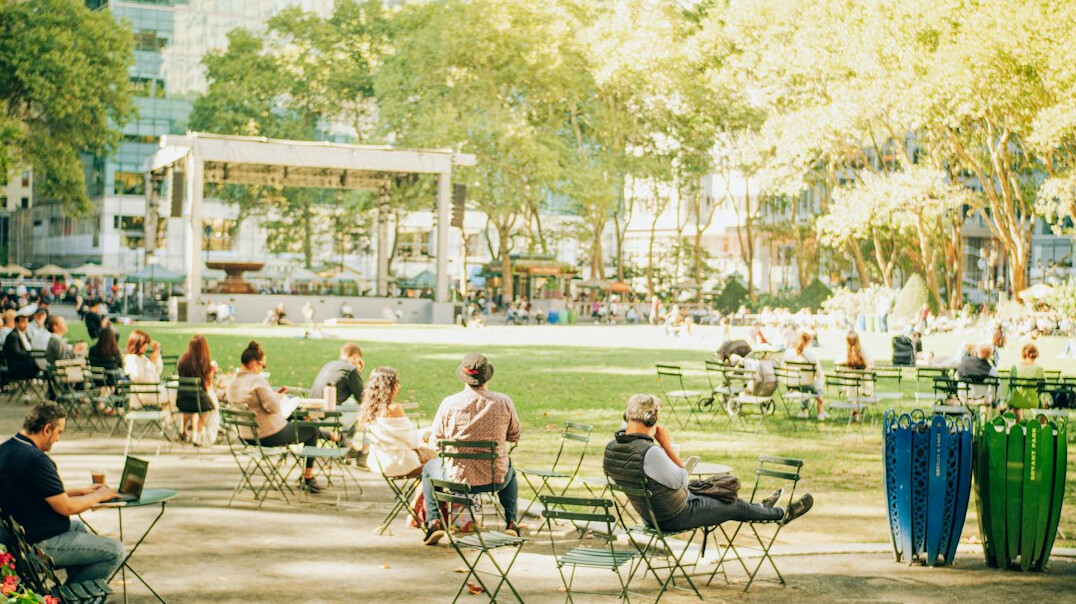people relaxing in park