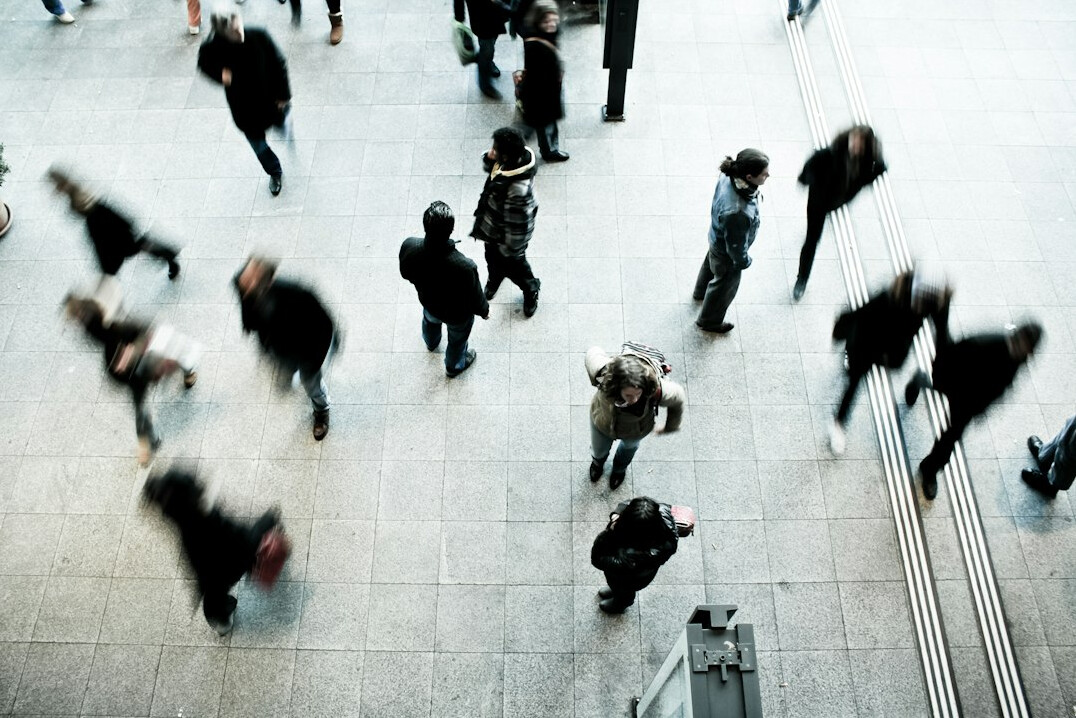 busy city sidewalk with pedestrians
